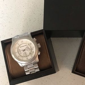 $200 each Michael Kors watches